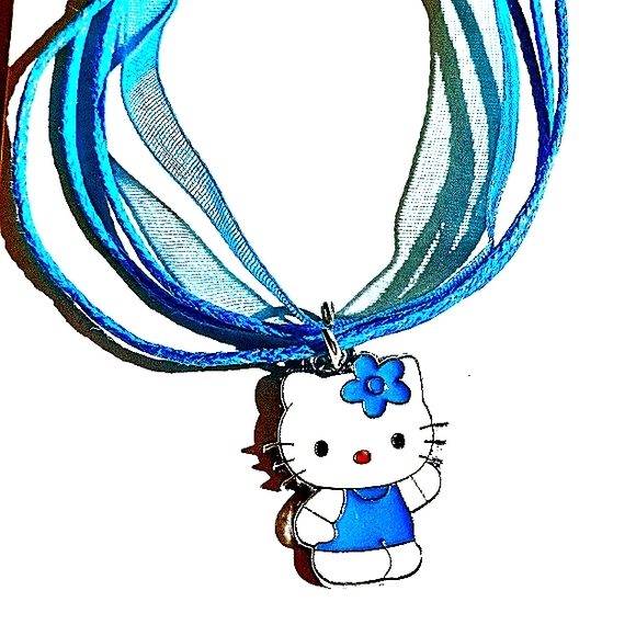 SOLD .......SOLD...,,......All In Blue Charm On A Blue Layered Ribbon Necklace - Picture 1 of 6